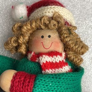 Knit crafted Christmas Caroler golden locks girl